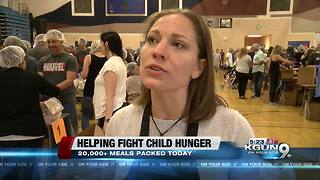 Volunteers pack more than 20,000 meals to fight child hunger
