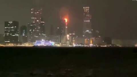 Flames tear through the night in Hong Kong, a skyscraper under construction is on fire