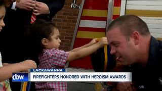 Firefighters honored for saving two children
