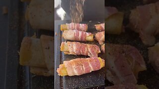 Sausage stuffed bacon wrapped pasta shells
