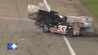 Race drivers get in fight after crash