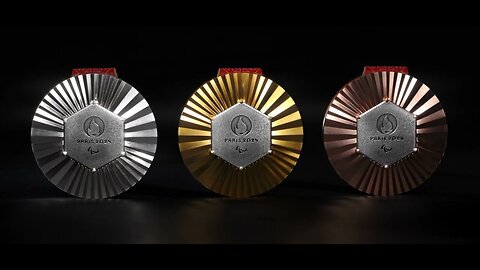 LVMH svela le medaglie dei 33mi Giochi Olimpici e 17mi Paralimpici di PARIGI 2024 le medaglie olimpiche hanno un motivo ad esagono di Saturno o cubo di metatron sul lato principale e sul retro la vittoria alata del culto misterico di samotracia o altro