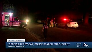 Two people hit by car, police search for suspect