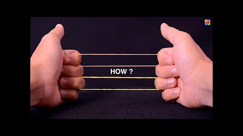 New rubber band magic trick