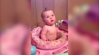 Baby Can't Stop Laughing at a Bucket on her Head