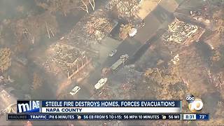 Steele fire destroys homes, forces evacuations