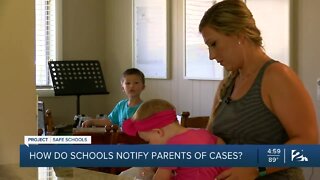 How do schools notify parents about COVID-19 cases?