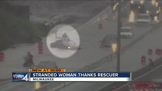 Woman stranded in flood thanks Good Samaritan who helped her