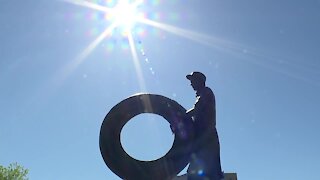 Akron unveils rubber worker statue in downtown