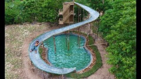 Build a primitive pool with water slide around the mud house - full video