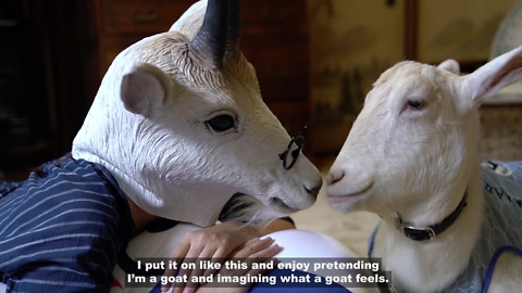 Woman Obsessed With Pet Goat Puts On A Mask To Become One