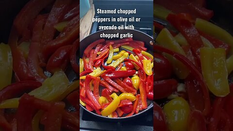 Steamed chopped peppers cooked in olive oil or avocado oil with chopped garlic