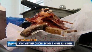 Rainy weather cancels events and hurts businesses