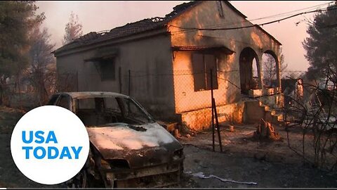 Residents in Greece return to damaged properties after wildfire _ USA TODAY