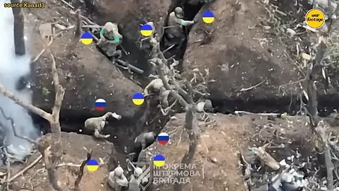 Drone footage shows Russians surrendering to Ukraine soldiers in trench
