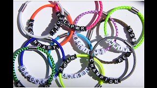 Teacher uses words on a bracelet to inspire students