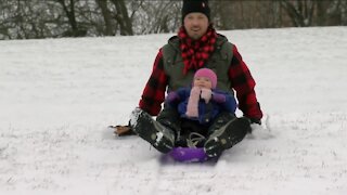 Families enjoy first snow fall