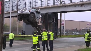 Dump truck hits pedestrian bridge on I-77 near Pershing Avenue