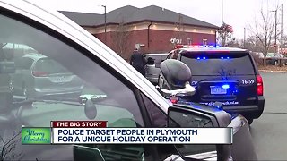 Police surprise people in Plymouth by stopping them to hand out gifts