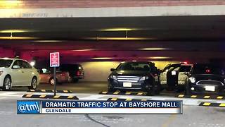 Dramatic traffic stop at Bayshore Mall regarding stolen license plate