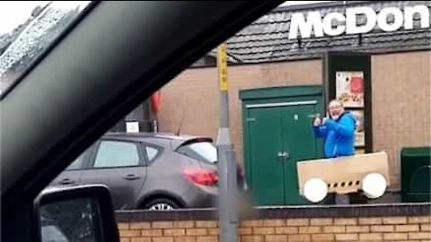 Man cues up at McDonald’s drive-thru in cardboard card
