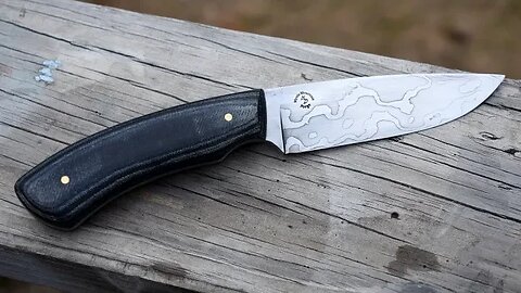 Forging a low layer damascus hunter with Denim handle