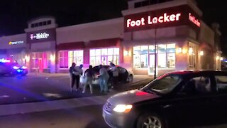 People Sing and Dance Outside Looted, Destroyed Stores Near Minneapolis