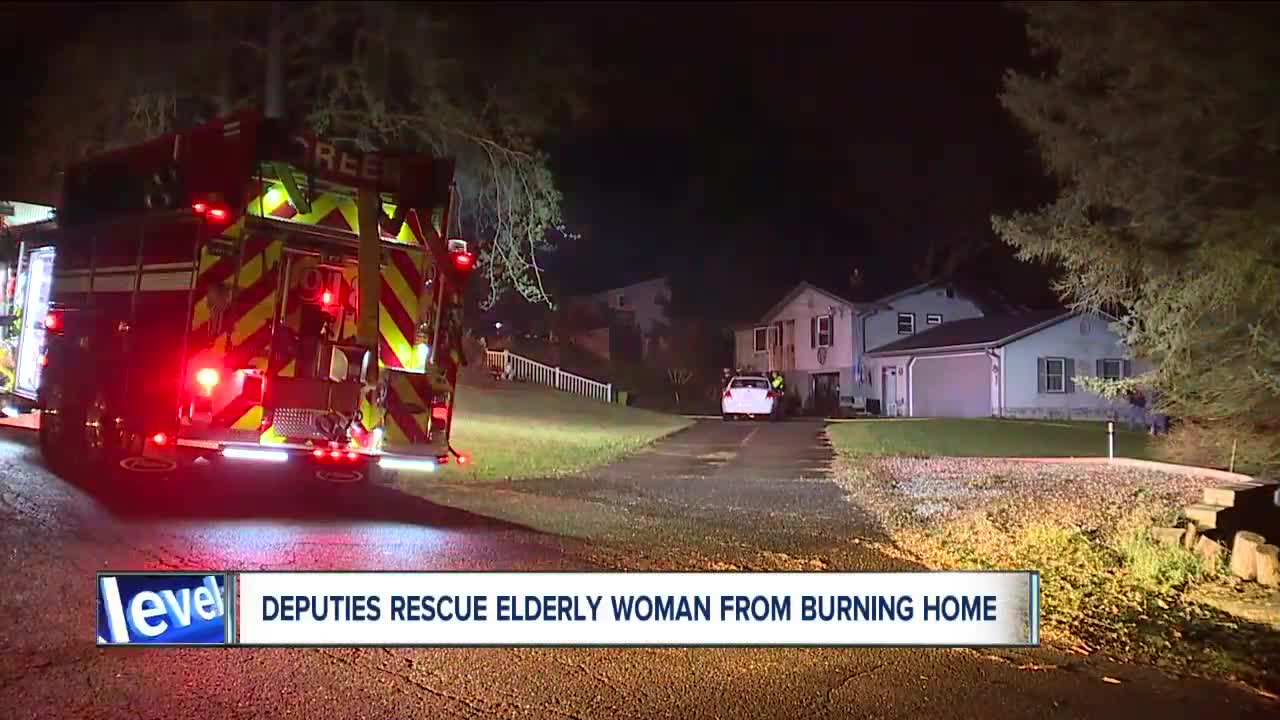 Summit County deputies hailed as heroes after rescuing elderly couple from house fire in Green