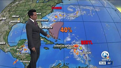 Tropical Storm Chris spins off the Carolina coast; Beryl's remnants to bring heavy rain to Puerto Rico