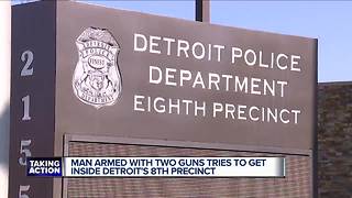 Man brandishing two guns tries to get into police precinct, woman drives him to hospital for help