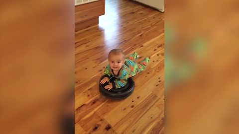 Baby Boy Rides On Roomba Vacuum
