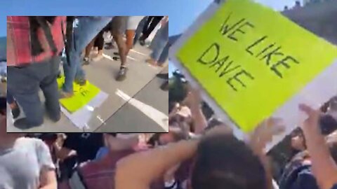 Woke mob destroying “We Like Dave” sign