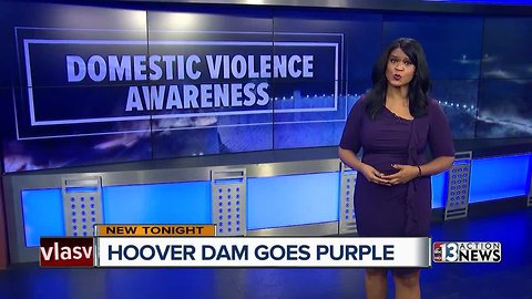 Hoover dam turns purple for domestic violence awareness