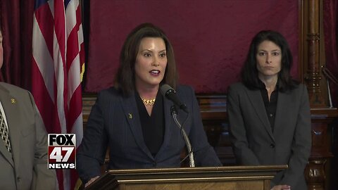 Whitmer threatens car insurance bill veto