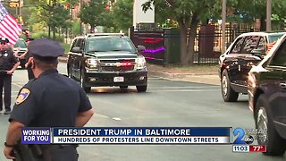 Signs, screams take over Baltimore as President Trump makes his way to the city