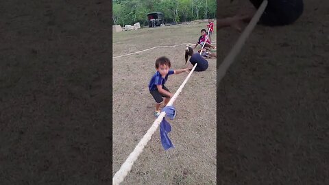 Baby in Over His Head Doing Tug of War!
