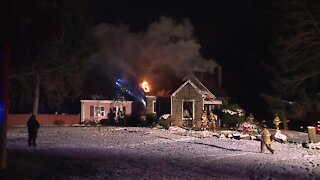 3 Norton police officers rescue 2 people from house fire that left 1 dead