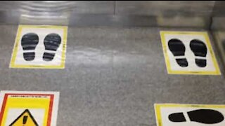 Tokyo elevator has floor marks to keep social distancing