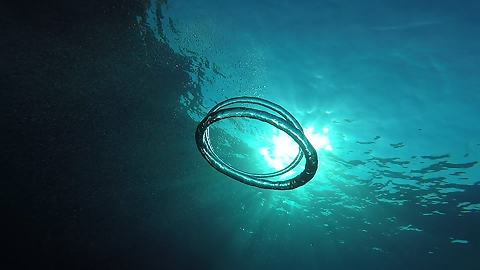 Mesmerizing Underwater Bubble Ring Art