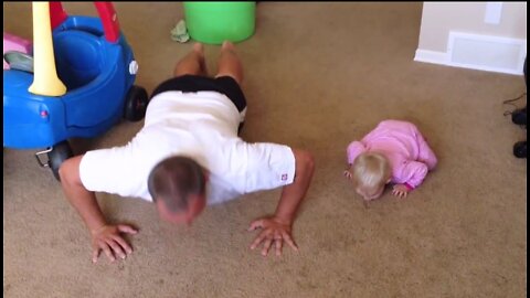 Baby Exercising with Daddy