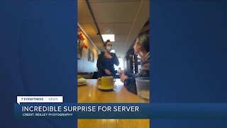 Local photographer surprises restaurant server with $1,000 tip from community