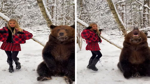 Friendship of a girl and a bear