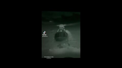 Military Helicopter Landing in windy conditions