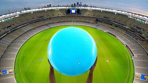 CATCHING EXERCISE BALLS with MAGNUS EFFECT from STADIUM ROOF!