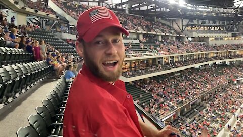 Owen Shroyer hung a “TRUMP WON” banner at the Texas Rangers game