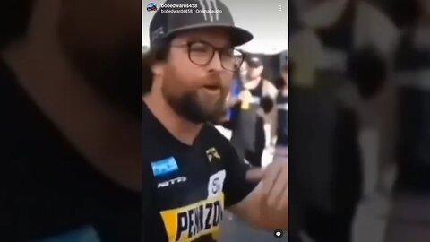 Motorsports Protestor gets beat down on and off the track