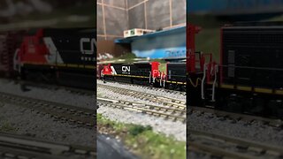 N Scale CN train leaves a signal. Great Sound