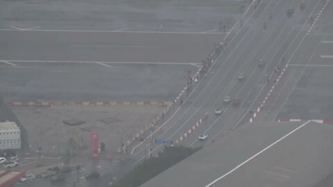 People and Cars Crossing an Active Airport Runway at Gibraltar