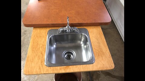 Butchering table with sink, fold up style