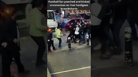 Football fan punched and kicked unconscious as rival hooligans brawl #shorts #footballfan #hooligan